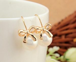 Golden Bow and Pearl Earrings