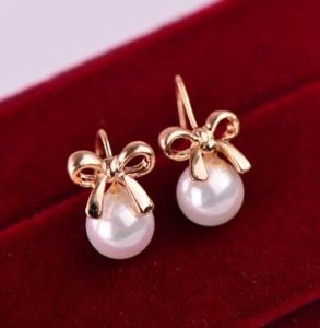 Golden Bow and Pearl Fashion Earrings