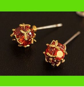 Golden Trim Ruby Ball Earrings