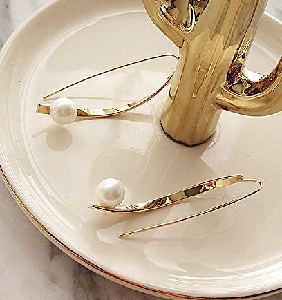 Pearl on Curved Line Golden Earrings